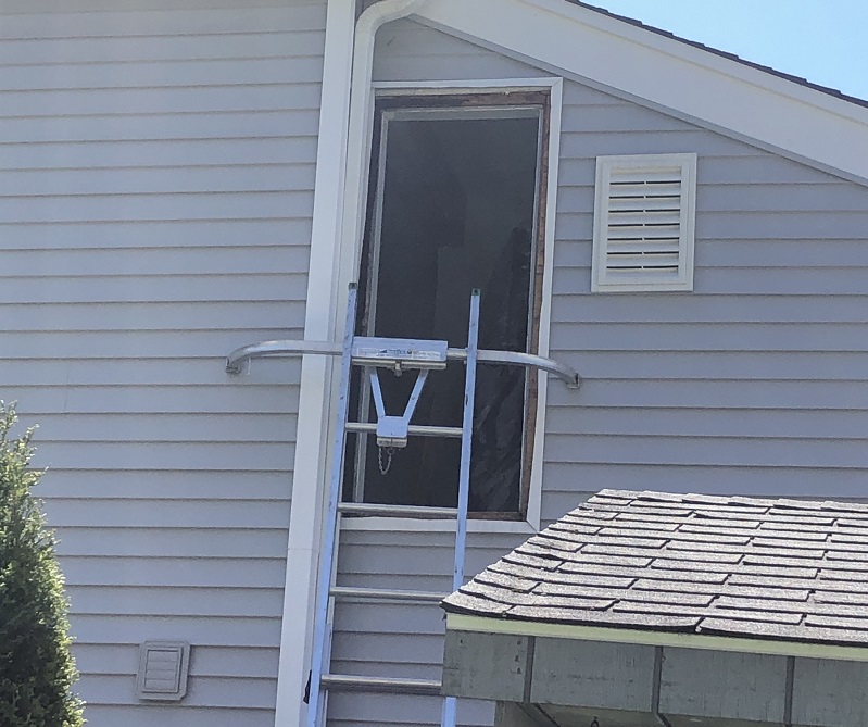 Remove exterior trim to prepare for installation